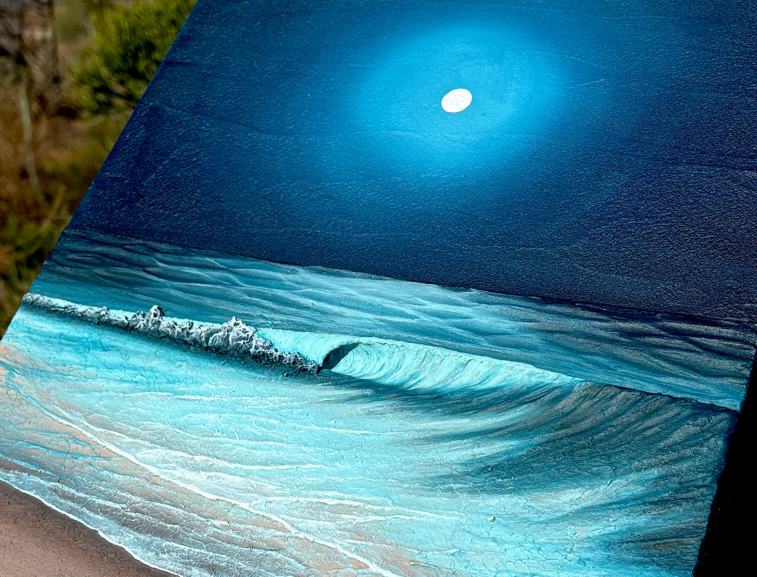close up of a sculptural moonlit ocean painting with 3d waves